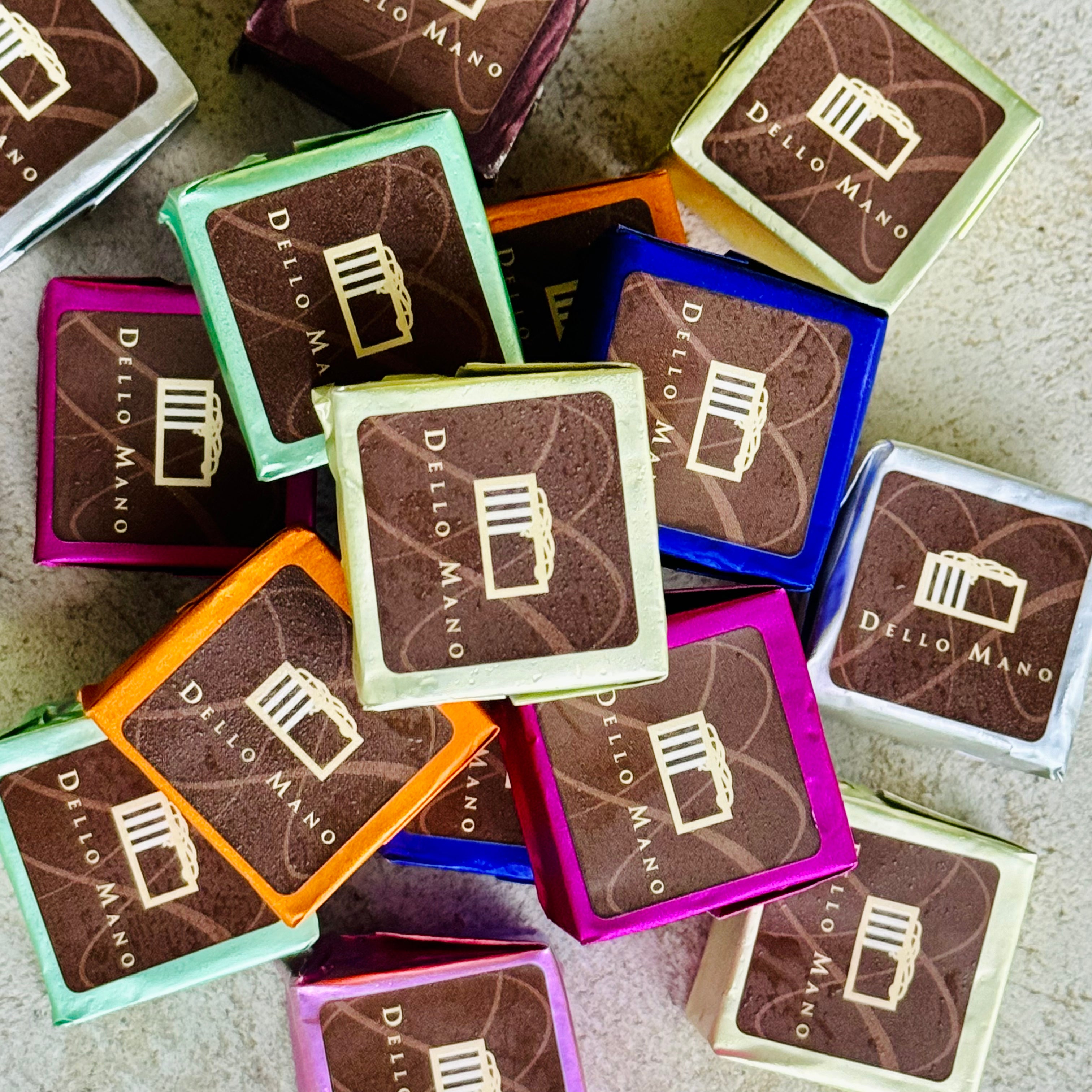 Close-up of luxury brownies in assorted flavours including raspberry hazelnut and salted caramel