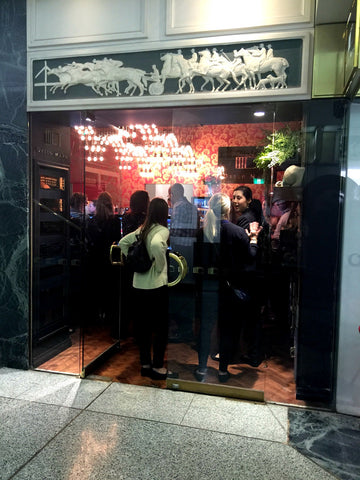 Daphne Mayo Frieze above the Dello Mano Store door at the Tattersalls Arcade