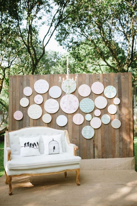 Even if you don’t like embroidering, you can still take embroidery hoops and use them for cool wedding decor. Attach lace to them and hang...