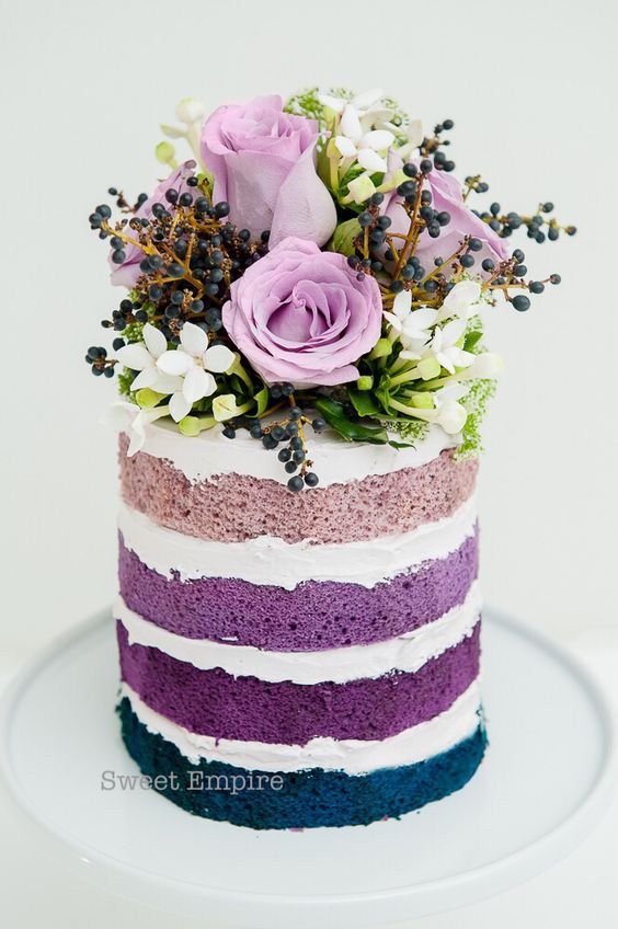 From classic white cakes, trendy colourful confections, rustic naked cakes to more creative and modern designs, here our our favourite wedding cake trends...