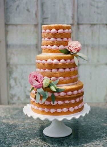 naked cake with strawberry pink buttercream filling!