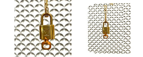 Gold Lock from Louis Vuitton on a gold necklace 