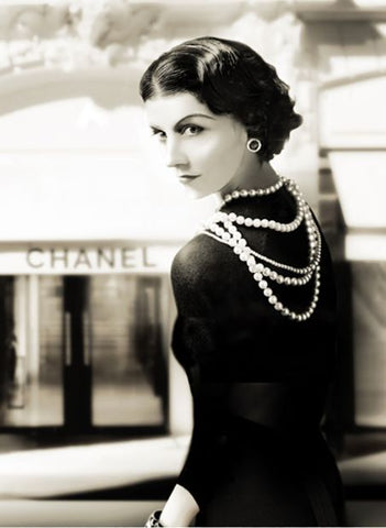 Designed by Coco Chanel Dress with strapped down bust, tubular