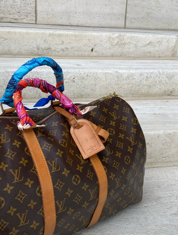 The History Of The Louis Vuitton Keepall Bag