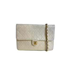 chanel cream clutch bag