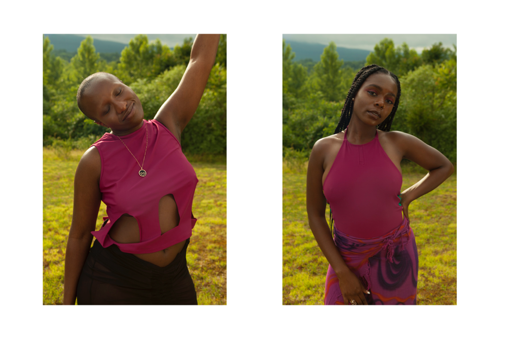 Black joyful model in a prairie with closed eyes, wearing magenta Marije top with cutouts.