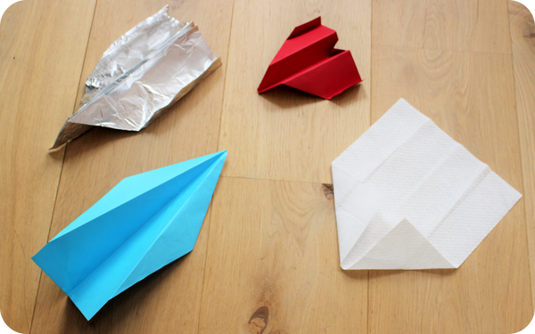 Paper airplanes made of different materials