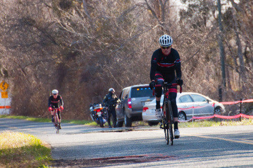 Mike leads Eric in.