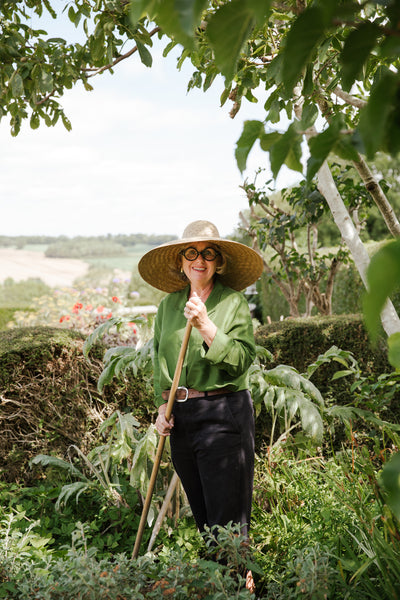 Angela Harding stands in her garden in the village of wing, Rutland. 