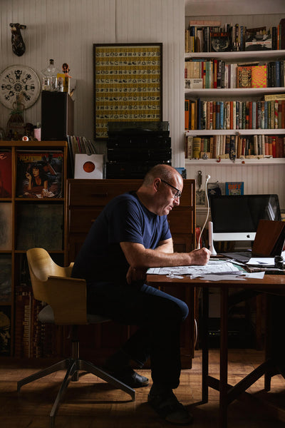 John Broadley works at his studio desk