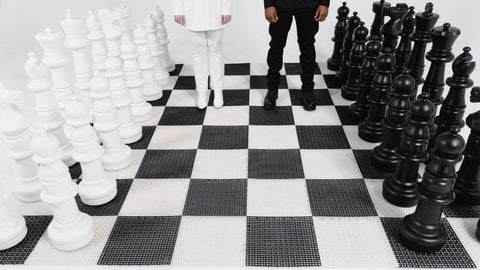 oversized chess set with people