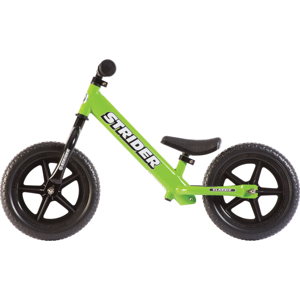 strider green balance bike