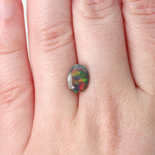 1.35 Carat Oval Black Opal for Custom Work - Inventory Code OBO135 - Midwinter Co. Alternative Bridal Rings and Modern Fine Jewelry