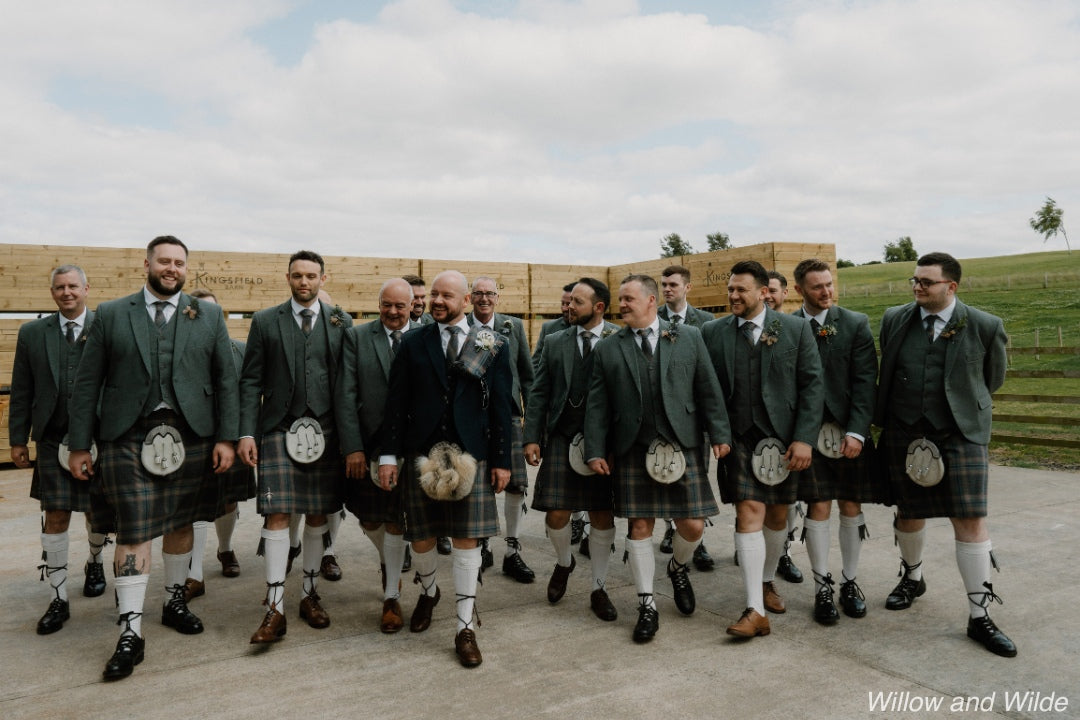 Grooms party wearing kilt outfits