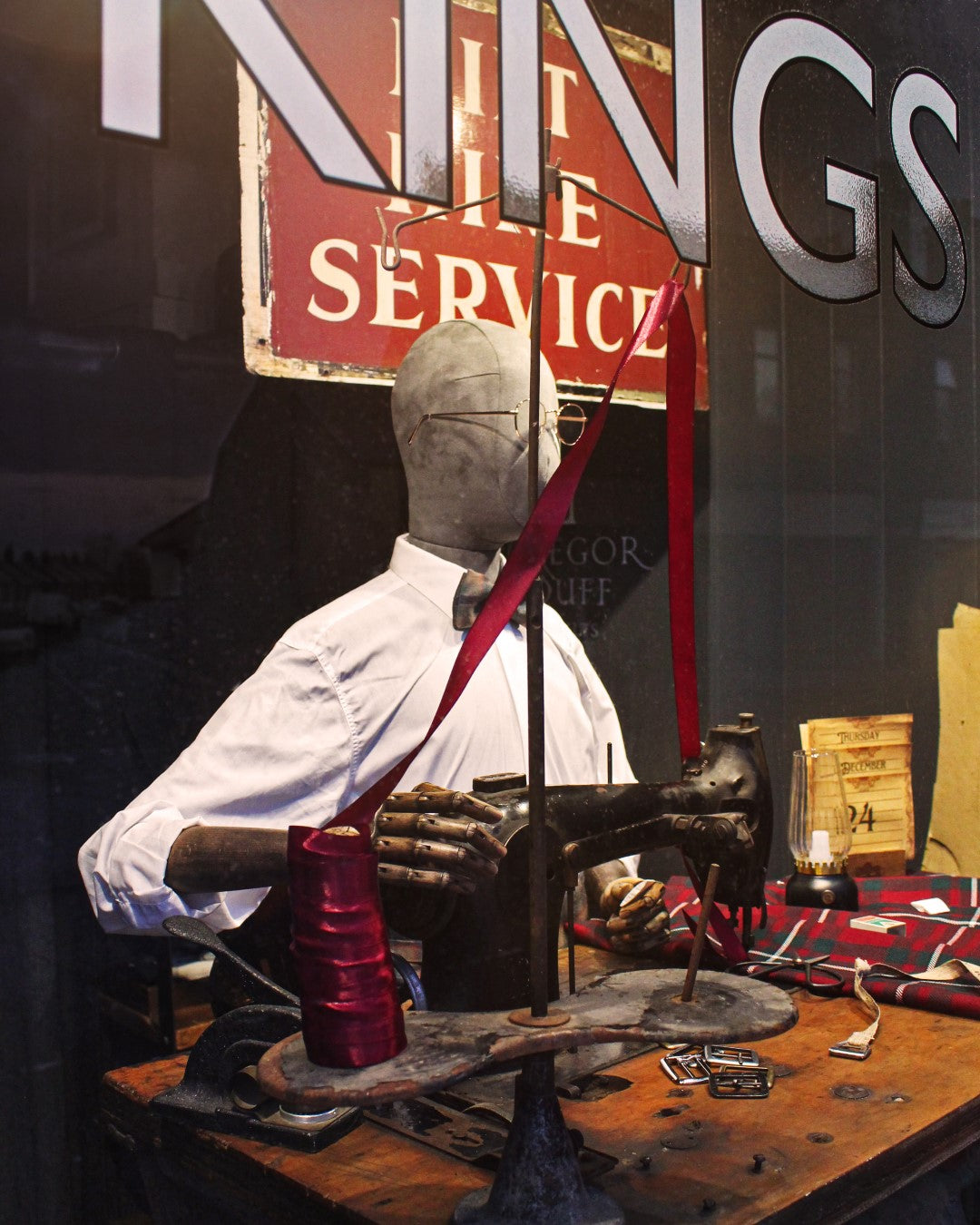 Kiltmaking mannequin in window display