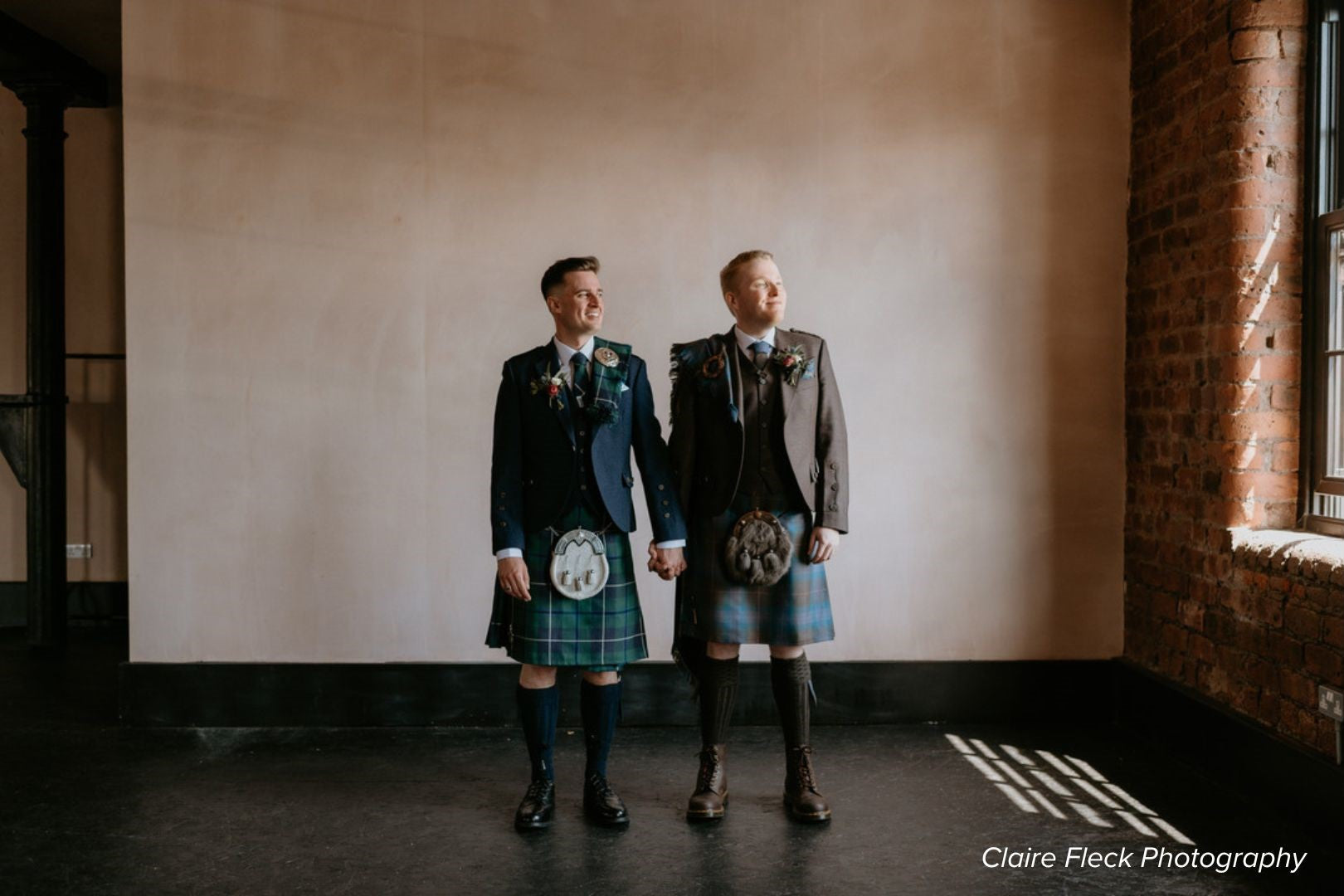 Grooms pose on their wedding day