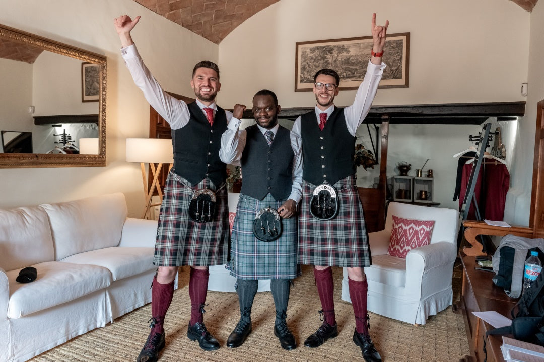 Groom and best man in kilts