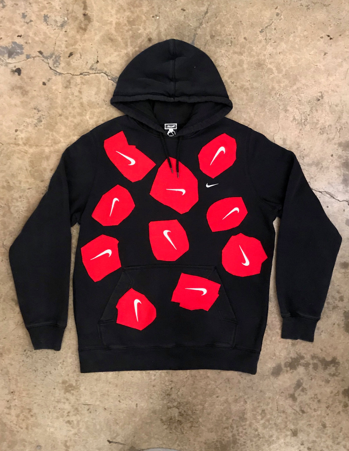 nike hoodie upside down logo