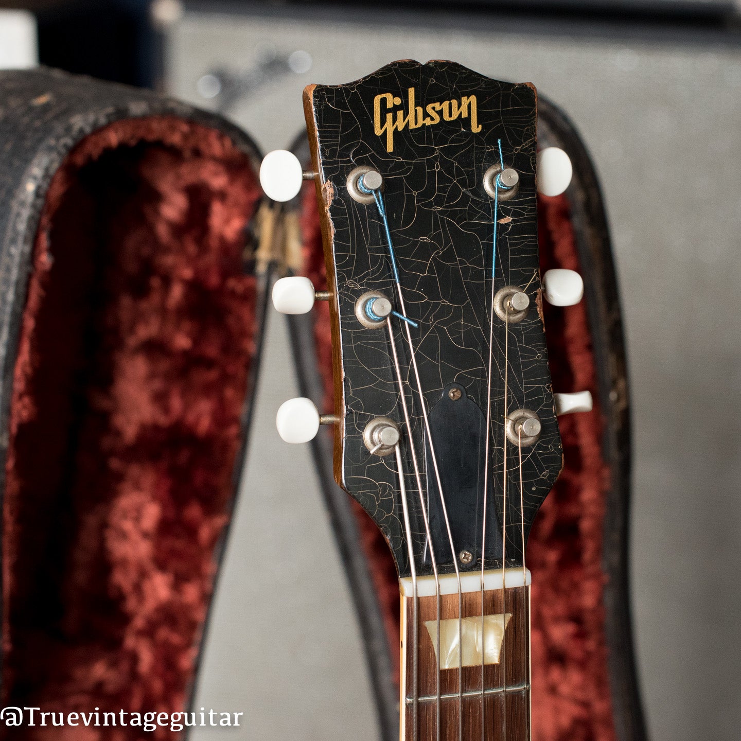 Gibson guitar headstock with finish checking 1950s