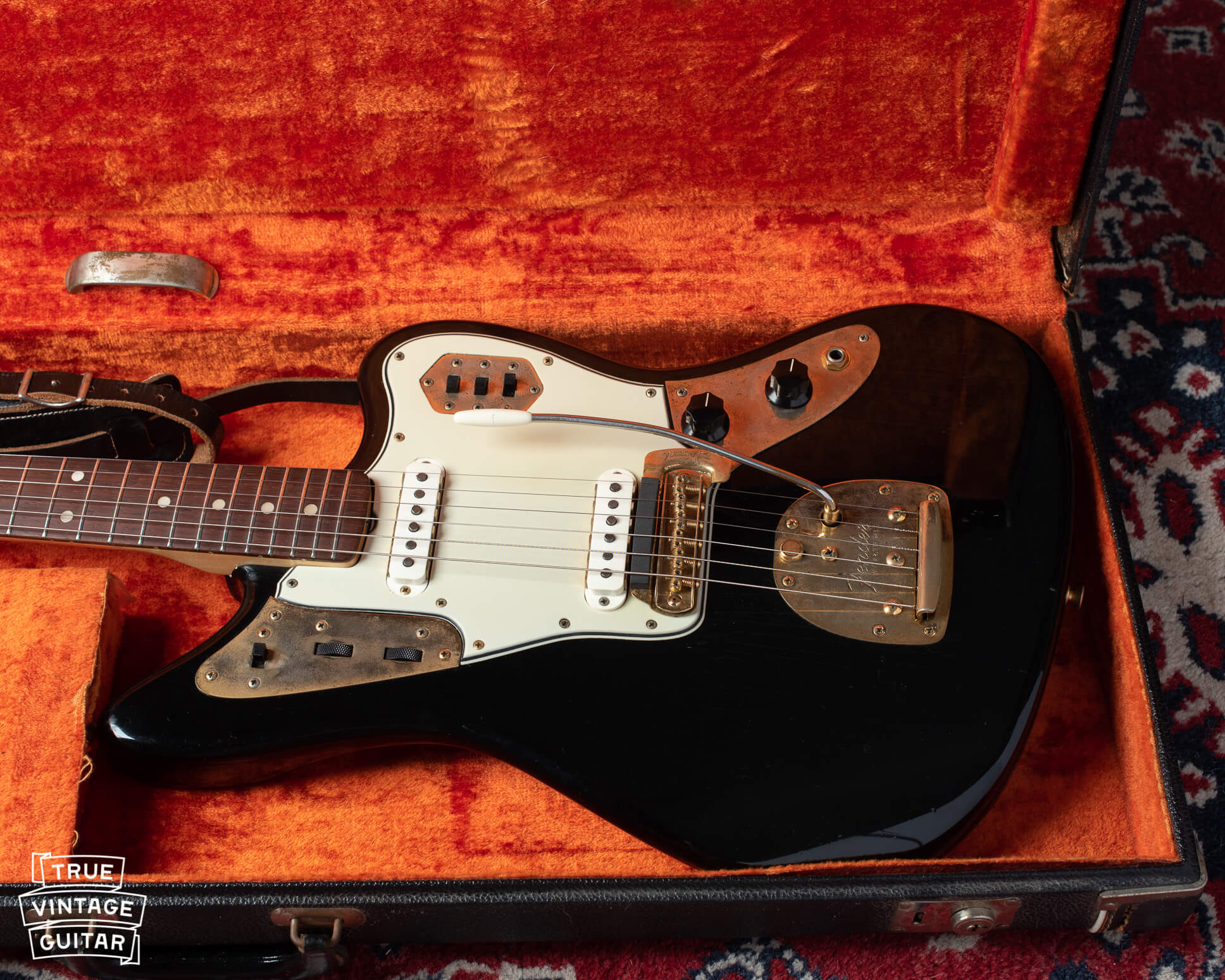 Fender Jaguar 1965 in custom color Black finish with matching headstock and gold hardware