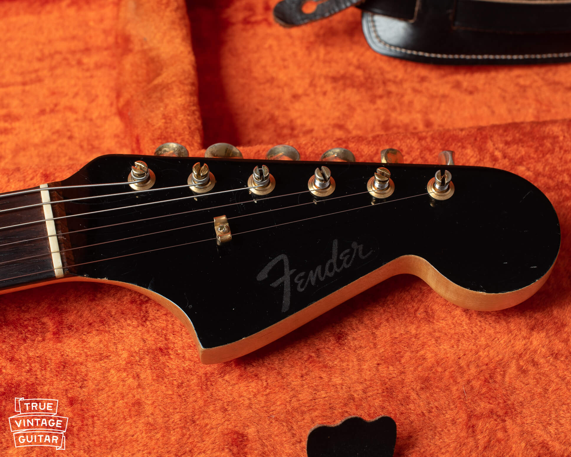 Fender Jaguar black with matching headstock and clipped logo