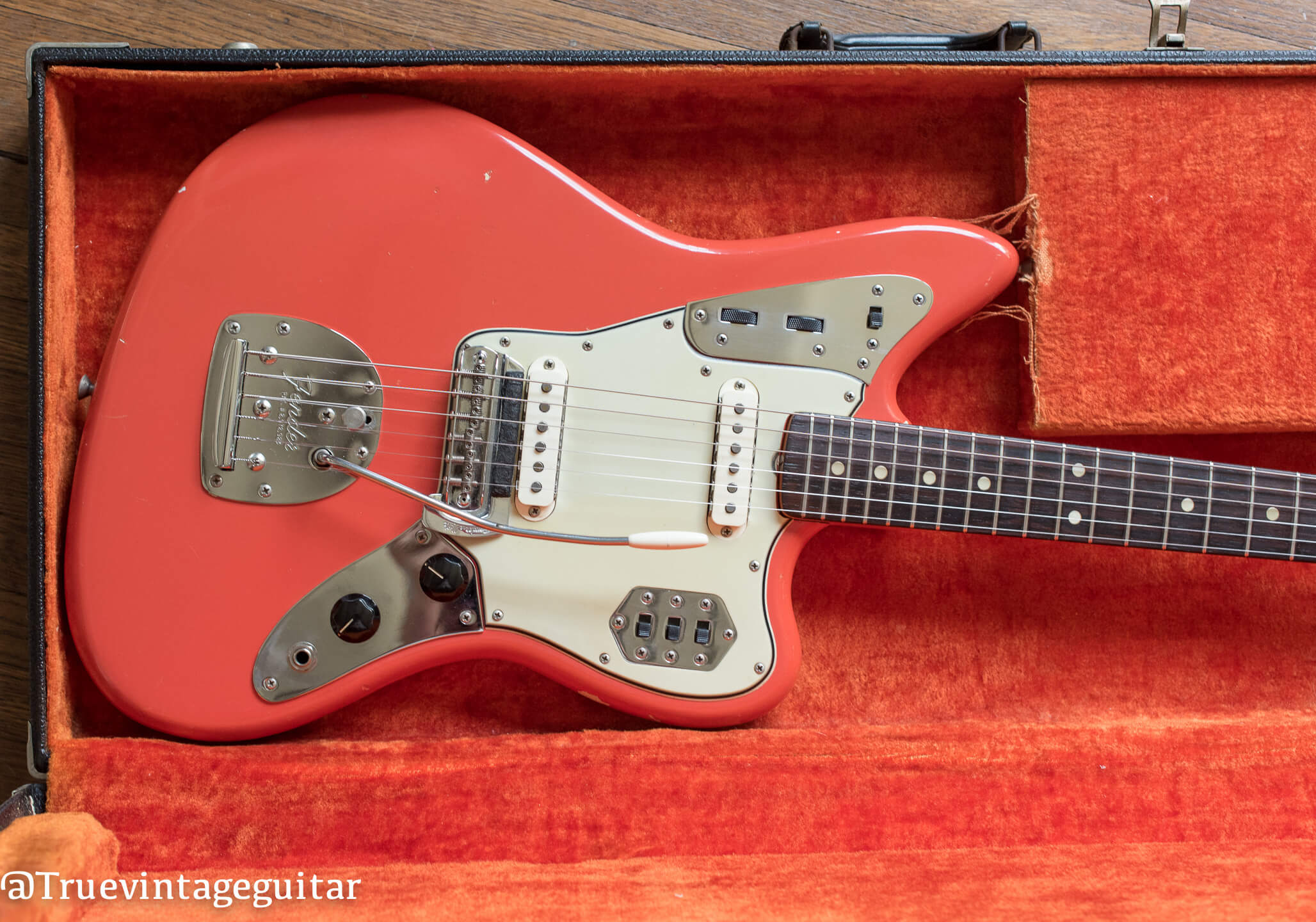 Fender Jaguar 1965 guitar in rare custom color Fiesta Red that looks pink and orange