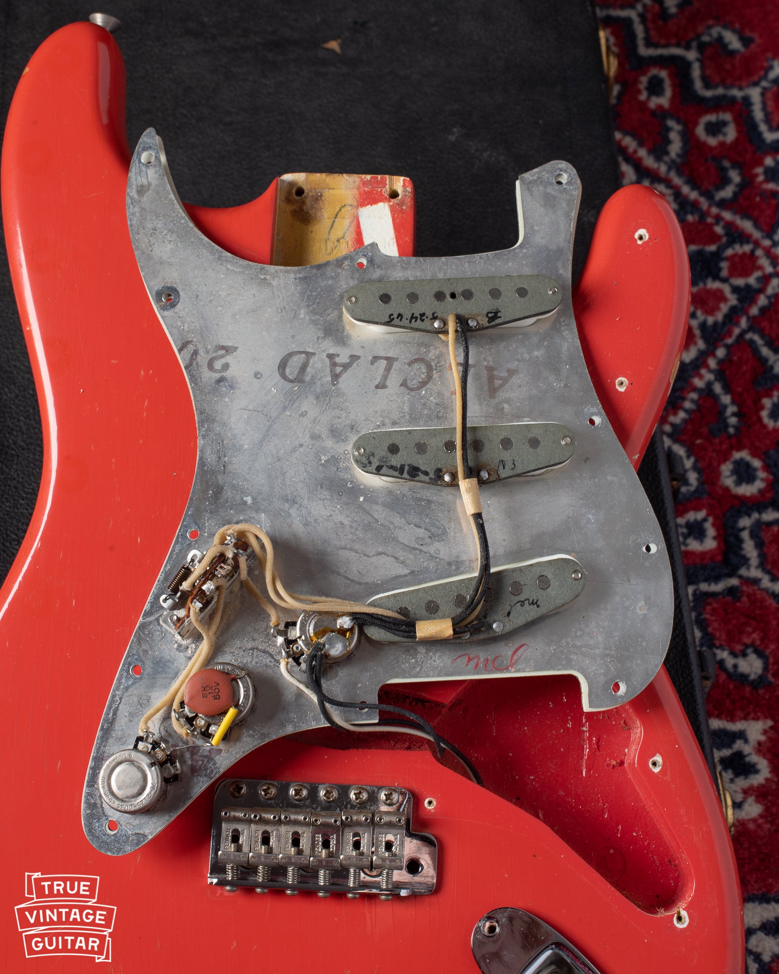 Pickups, potentiometers, switch, and electronics of 1960s Fiesta Red Stratocaster