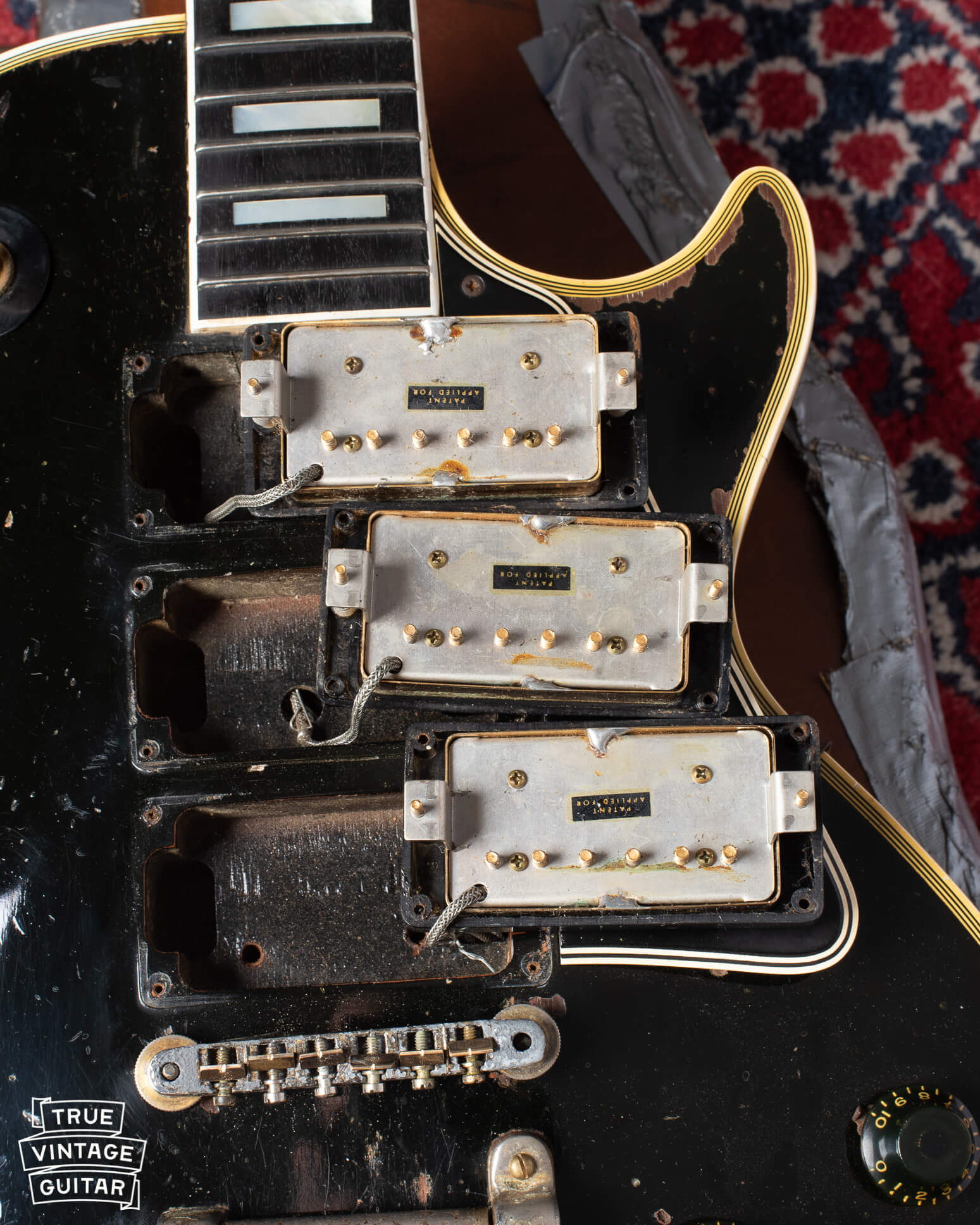 Three PAF sticker humbucking pickups in a 1960 Gibson Les Paul Custom