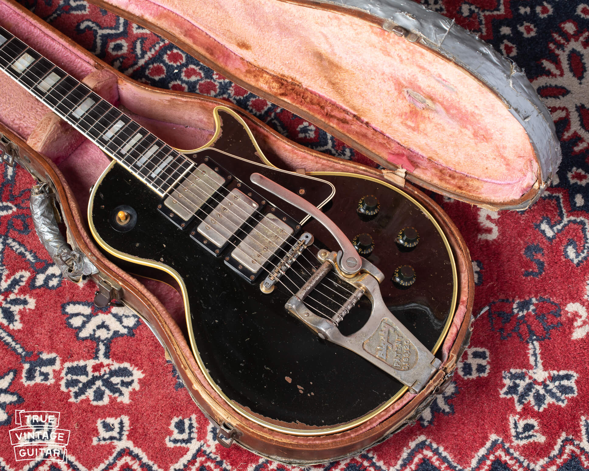 1960 Gibson Les Paul Custom Black with three gold humbucking pickups and Bigsby tailpiece
