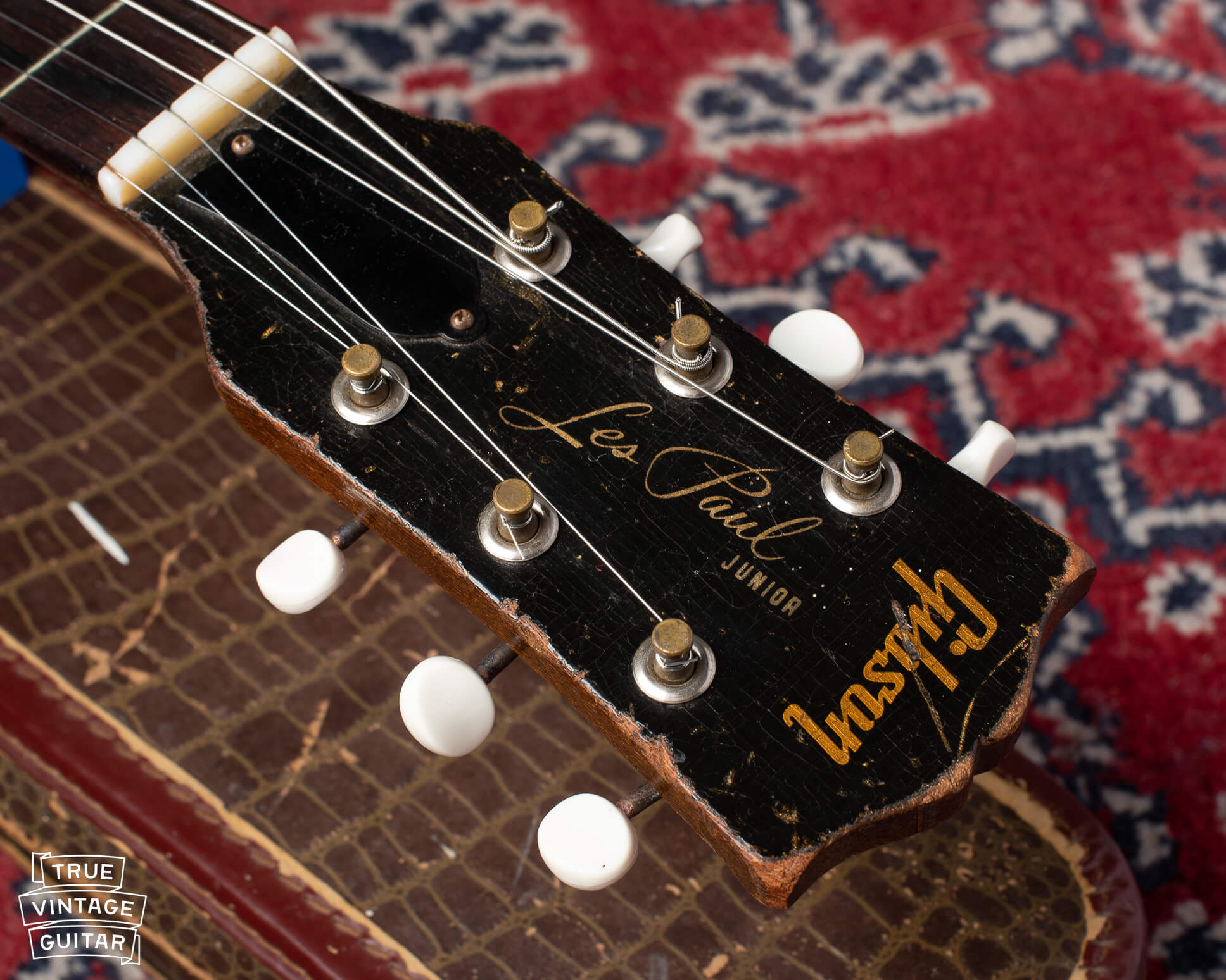 Les Paul silkscreen on the headstock of a 1955 Gibson Les Paul Junior