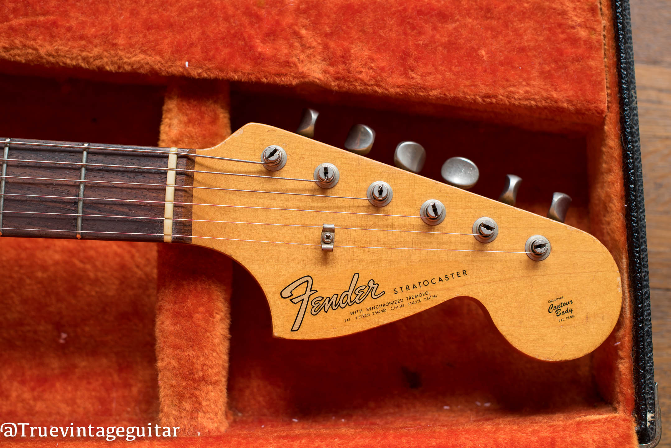 How to date a Fender Stratocaster with serial numbers, ink stamp dates, potentiometer codes, and features from a Fender guitar expert.