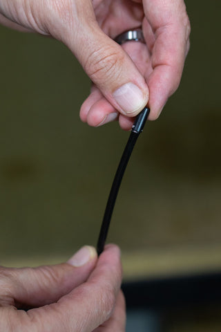 image showing a ferrule being placed on the cable housing