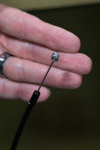 image showing cable housing pushed on the cable up to the barrel