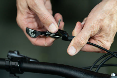 image showing hand turning the barrel adjuster on a ReMote