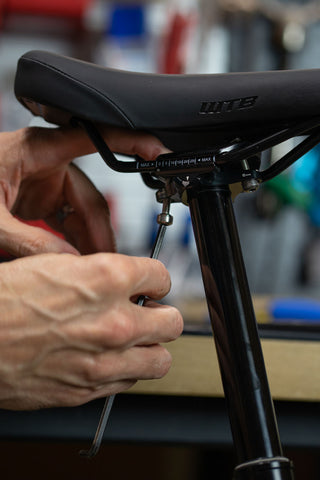 image showing hex wrench on rear bolt of saddle clamp