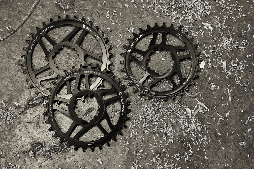 A grouping of Drop-Stop ST Wolf Tooth Direct Mount Chainrings for SRAM Cranks.