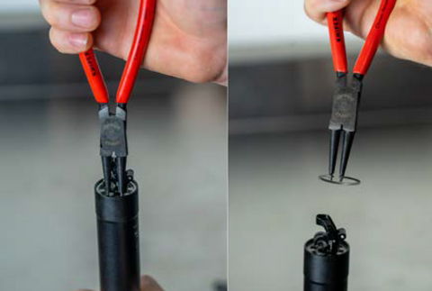 image showing snap ring pliers removing the snap ring