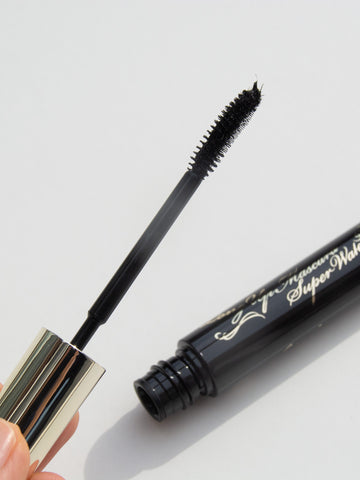 holding Heroine Make Kiss Me Long and Curl Mascara  with new packaging opened japanese version product review  ヒロインメイク ロングUPマスカラ スーパーWP 01 ブラック