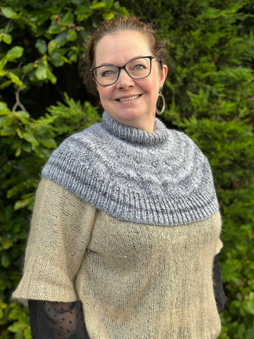 Sara in Neck Warmer knitted in James C Brett Marble Chunky