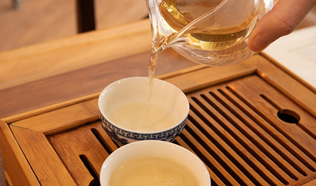 Wuliangshan Moonlight White Tea being poured into a cup