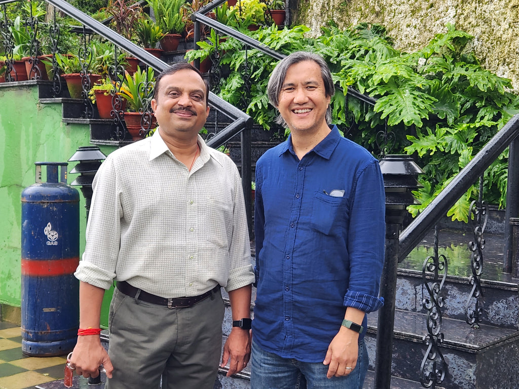 ic: Author with Okayti tea estate, manager, Pankaj Choubey.