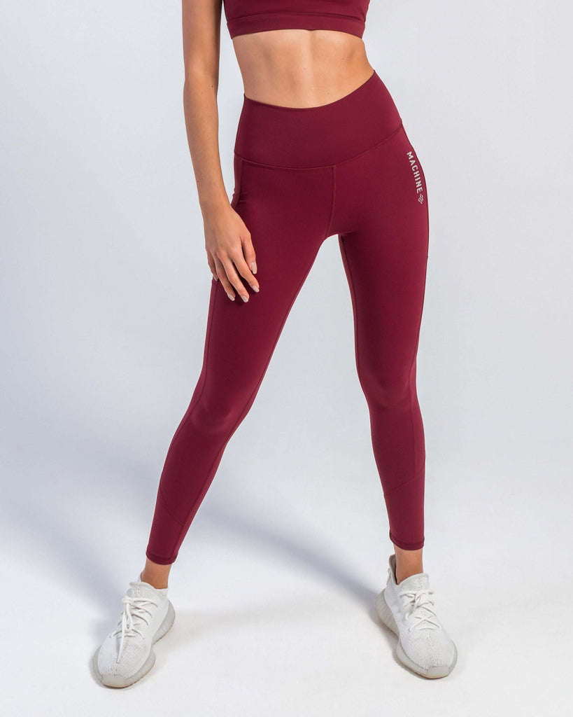 https://cdn.shopify.com/s/files/1/0231/7421/products/core-leggings-burgundy-machine-fitness-703006_1024x1024.jpg?v=1657057196