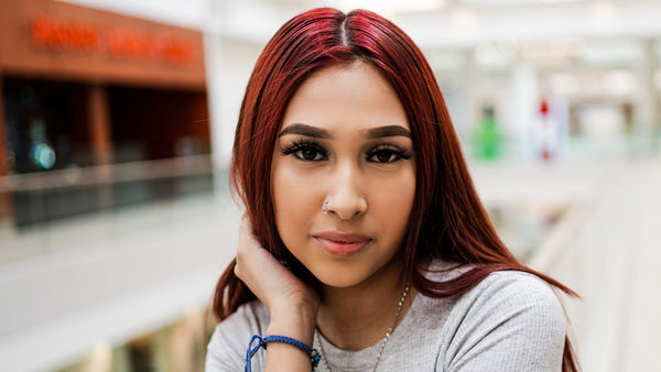 Woman with dark red hair