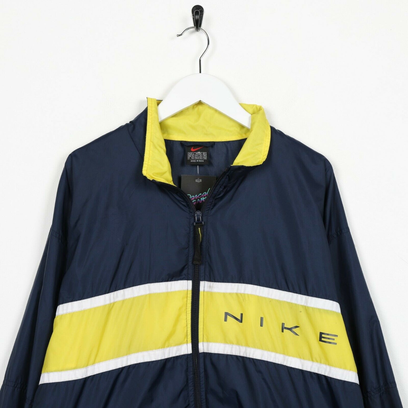 blue and yellow nike jacket