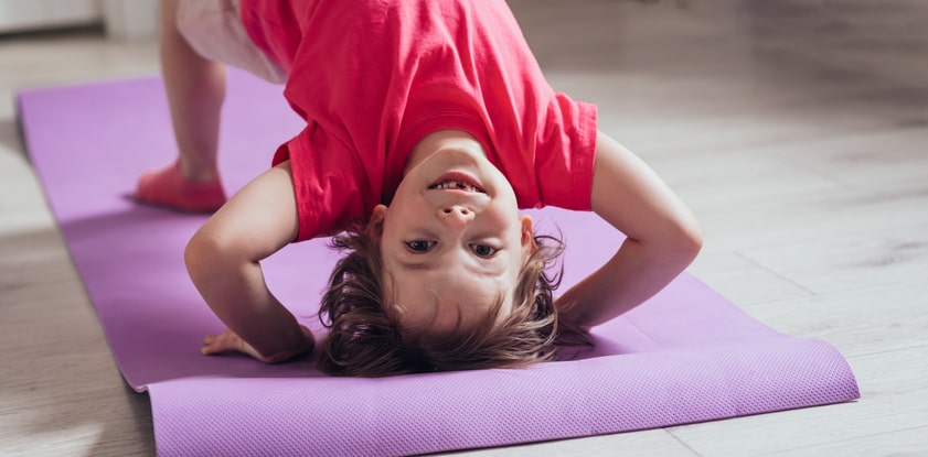 child-practising-yoga-physical-development-during-childhood.jpg