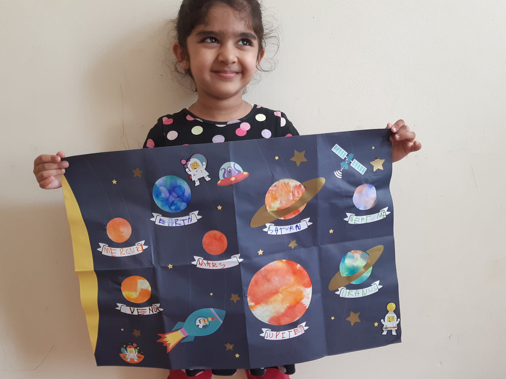 child-with-a-planet-poster-craft-developing-language-min.jpg