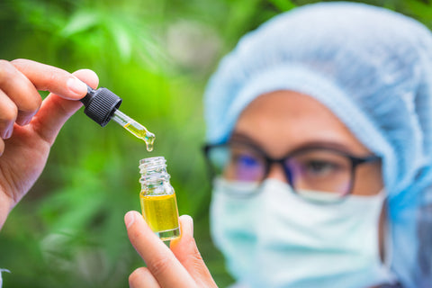 Scientist studying CBD for a drug test