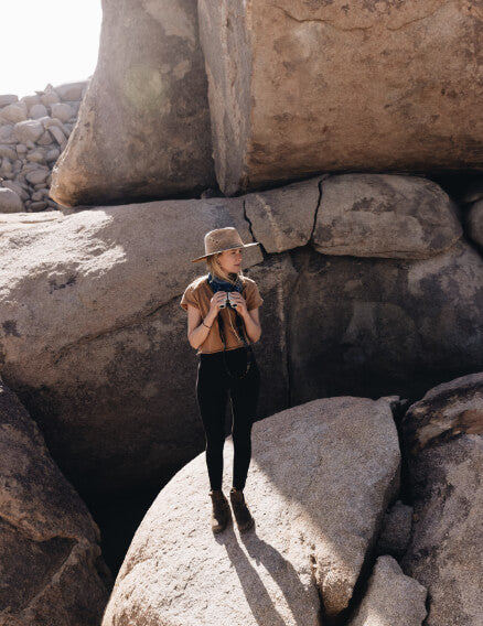 Johnie Gall using Nocs on a boulder