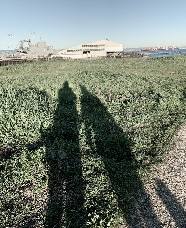 Picture of Lauren and a friend's shadows while on a hike