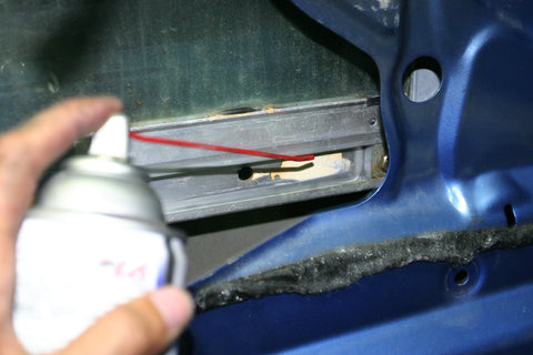 Greasing rails with white lithium grease.